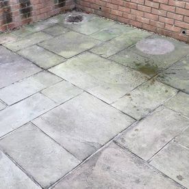 A patio that need cleaning